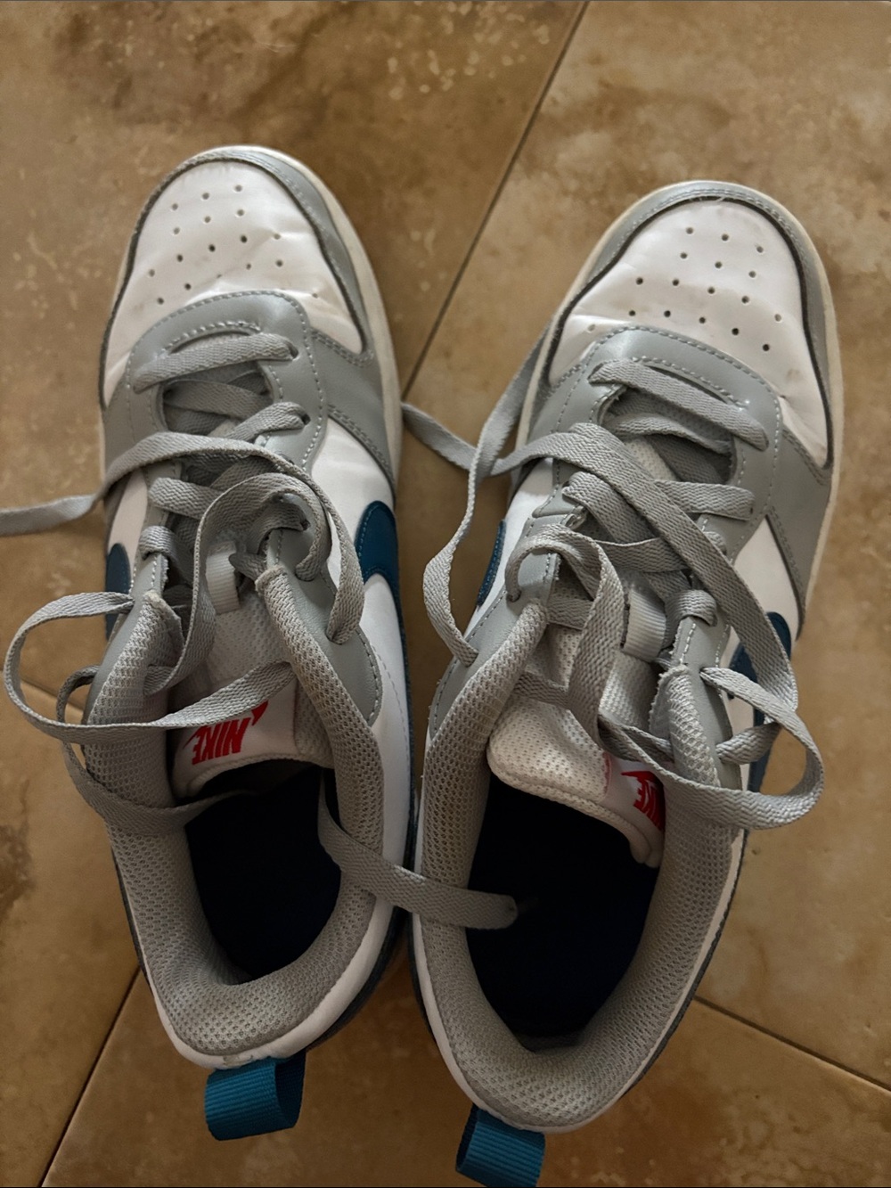 Nike Kids White and Gray Sneakers with Blue Swoosh
